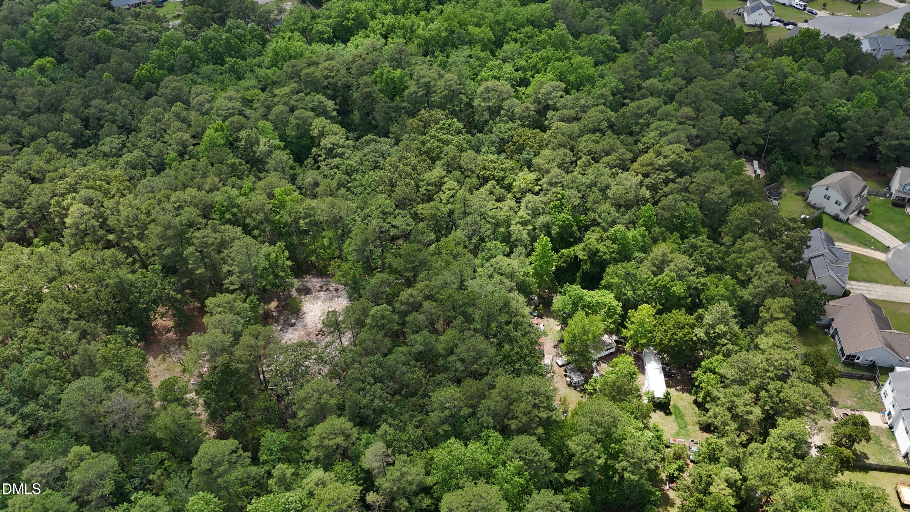 0 Elfman Drive Spring Lake, NC 28390 - Photo 34 of 40 an aerial view of residential house with outdoor space and trees all around