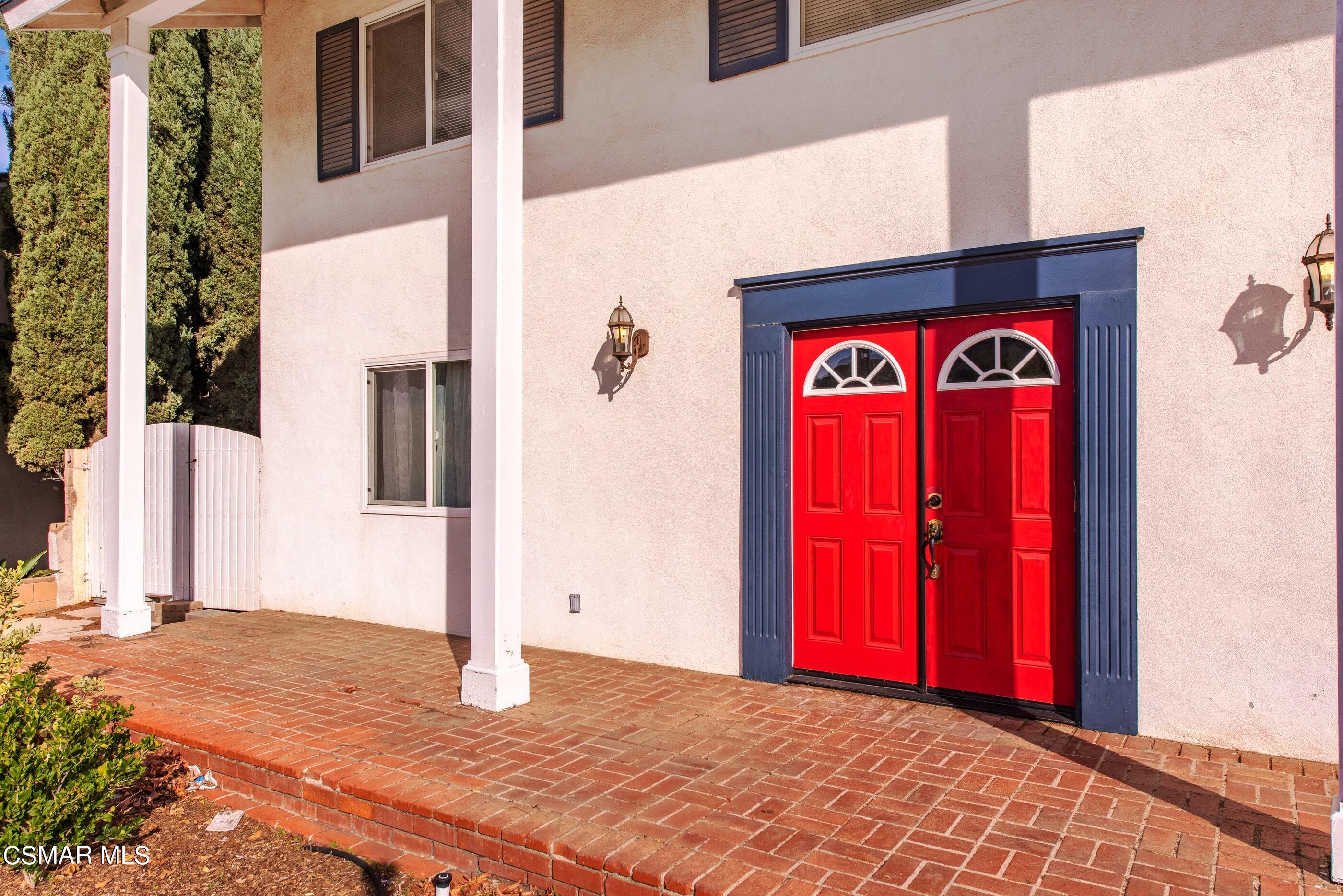 3043 Fitzgerald Road Simi Valley, CA 93065 - Photo 3 of 24 a view of a red door of the house