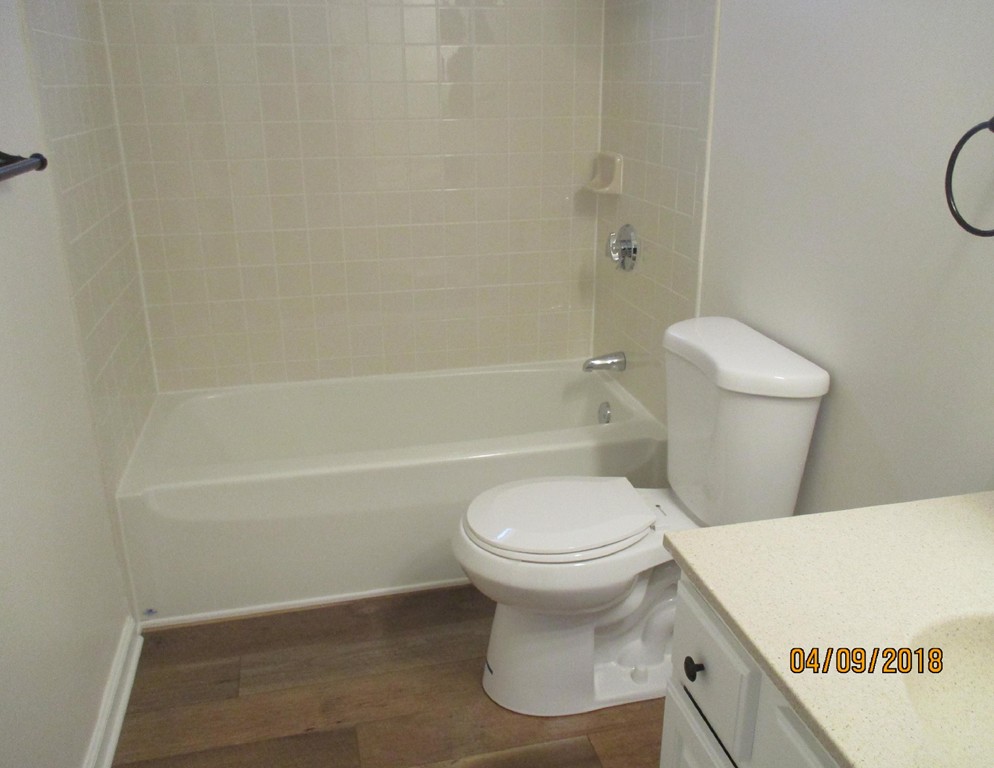 165 Swift Road Northbridge, MA 01588 - Photo 11 of 24 a white toilet sitting next to a bath tub