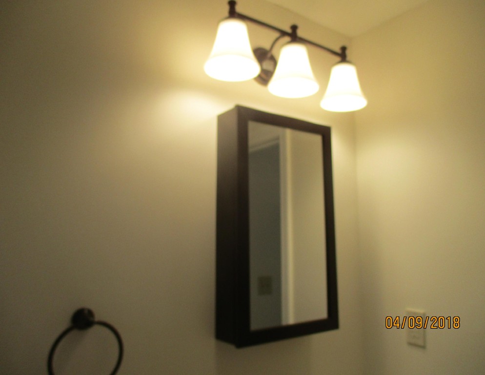 165 Swift Road Northbridge, MA 01588 - Photo 12 of 24 a bathroom with a mirror and a shower