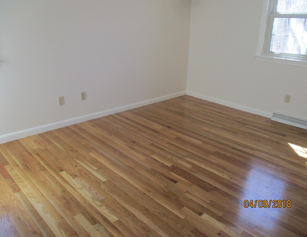 165 Swift Road Northbridge, MA 01588 - Photo 17 of 24 a view of a room with wooden floor and windows