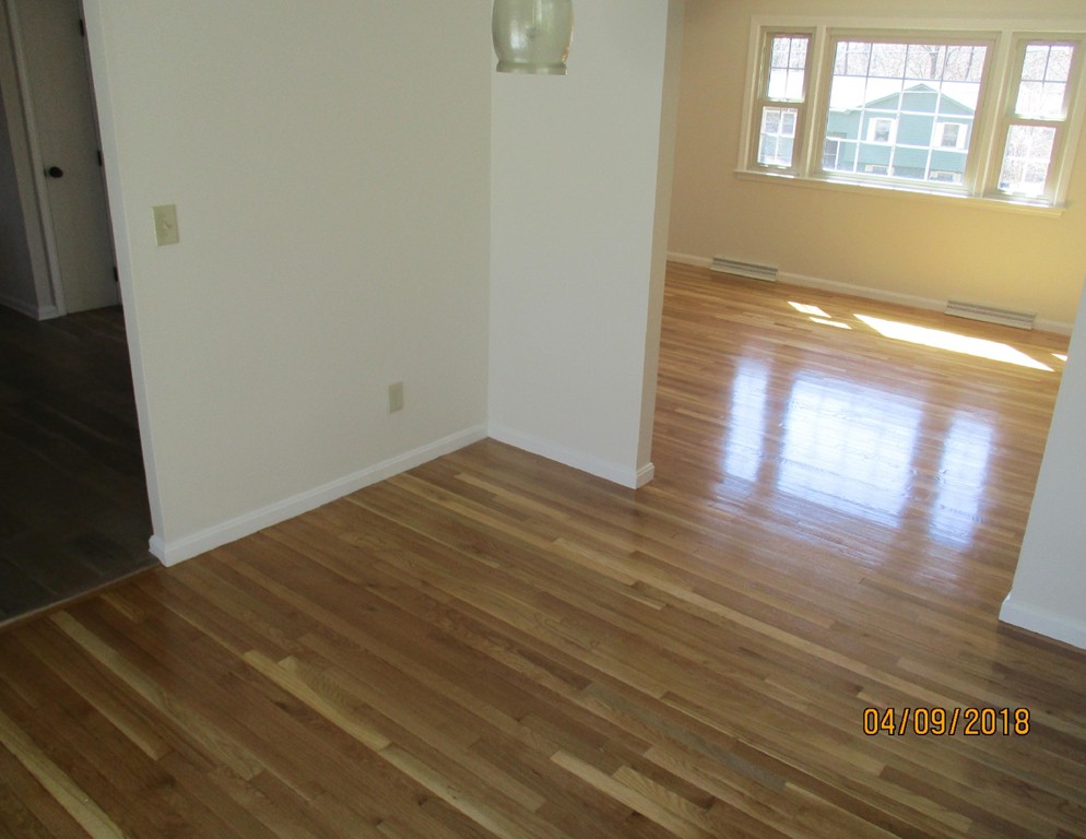 165 Swift Road Northbridge, MA 01588 - Photo 6 of 24 a view of empty room with wooden floor and fan