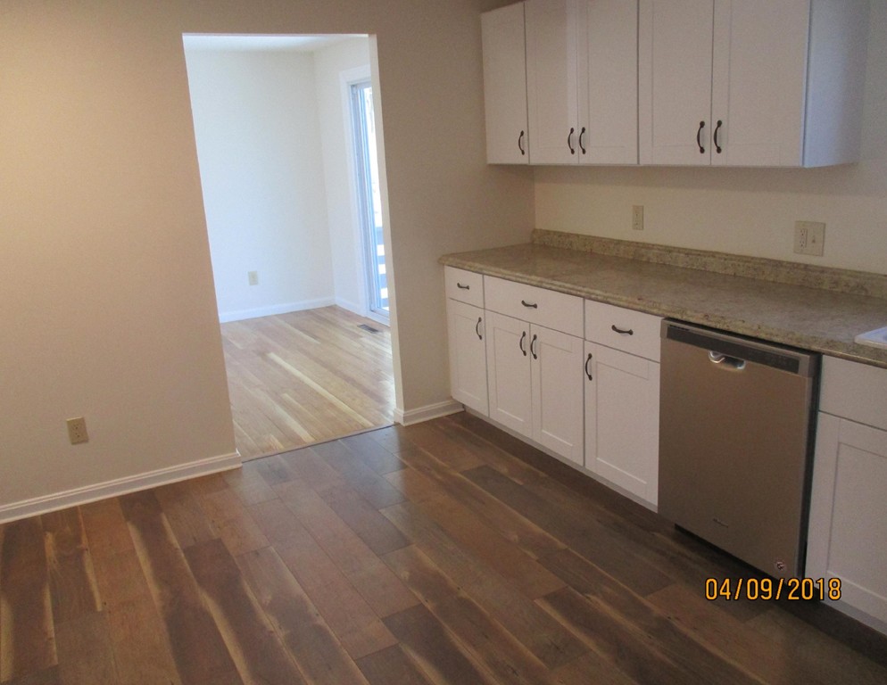 165 Swift Road Northbridge, MA 01588 - Photo 10 of 24 a view of a kitchen with wooden floor