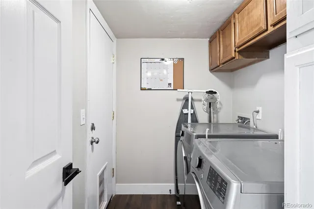 a kitchen with a sink and a refrigerator