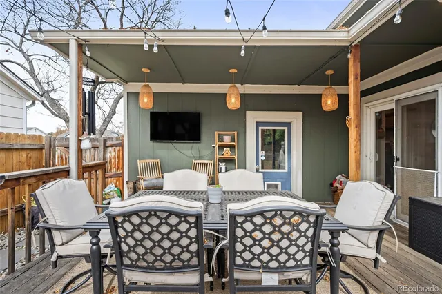 a outdoor space with patio furniture and a fireplace