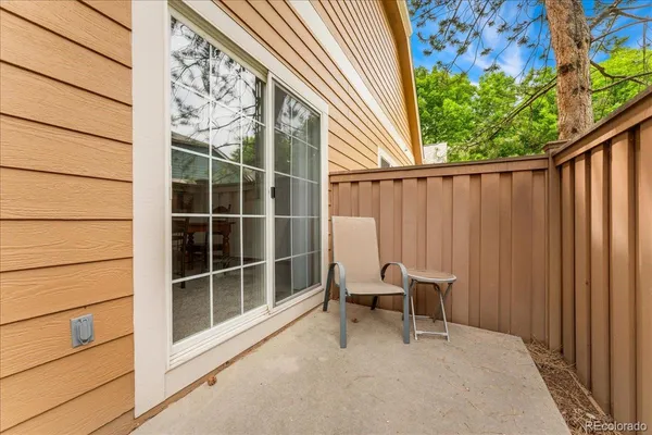 a view of a chair in the balcony