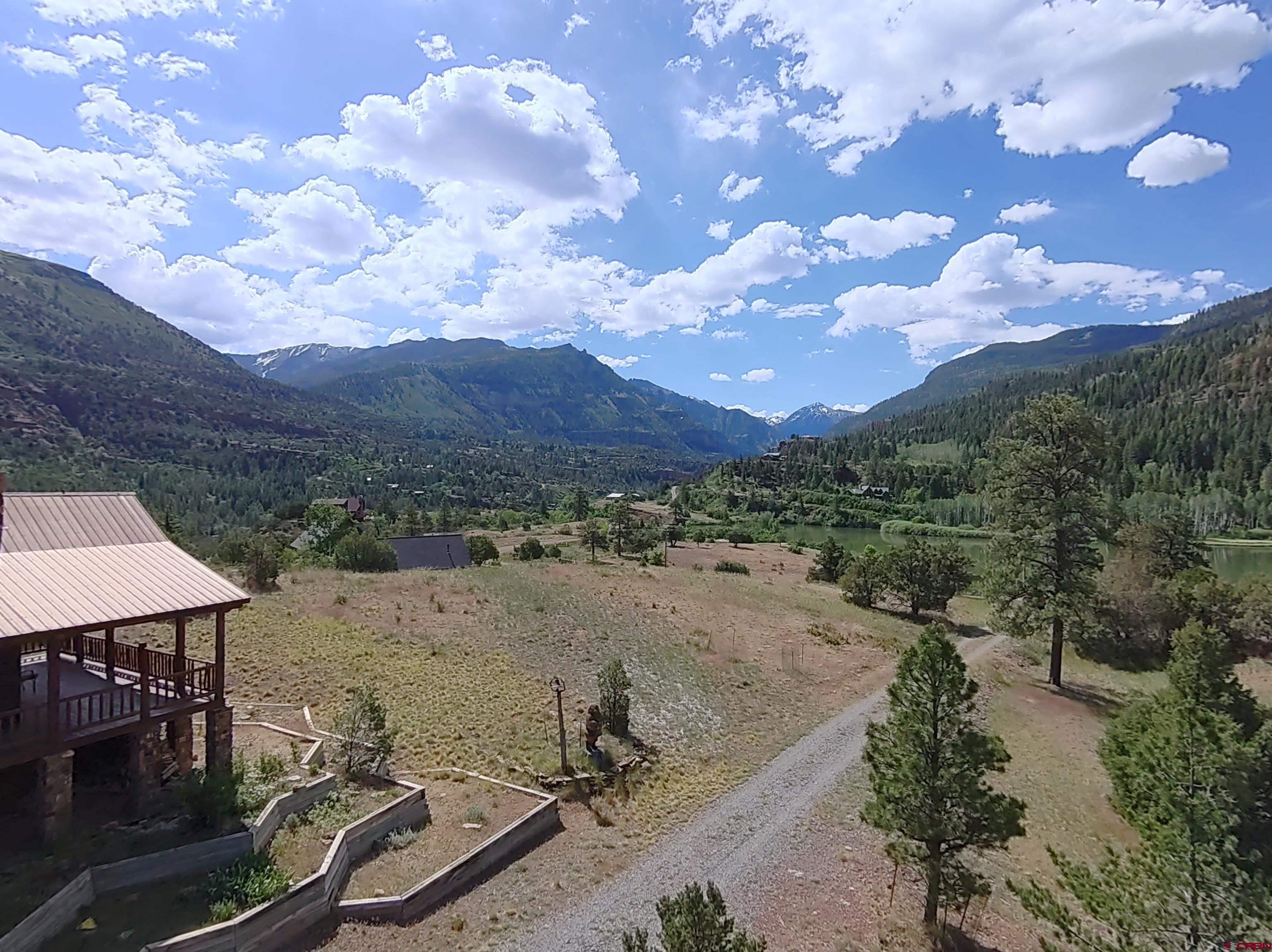 2692 County Road 17 Ridgway, CO 81432 - Photo 37 of 38 a view of a lake in middle of the forest