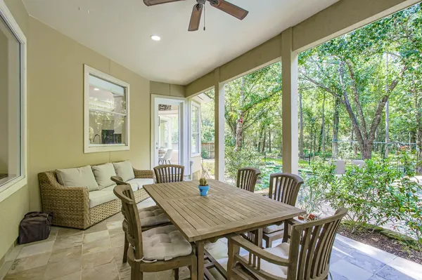 a view of a dining room with furniture window and outside view