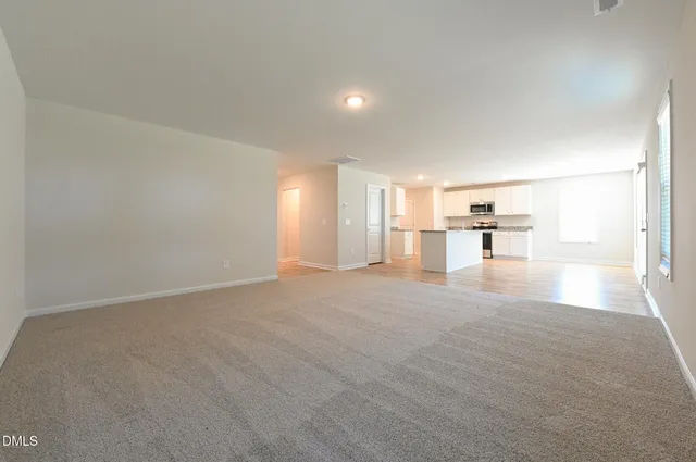 a view of kitchen with wooden floor