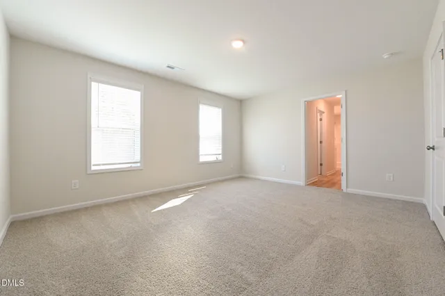 an empty room with a natural light