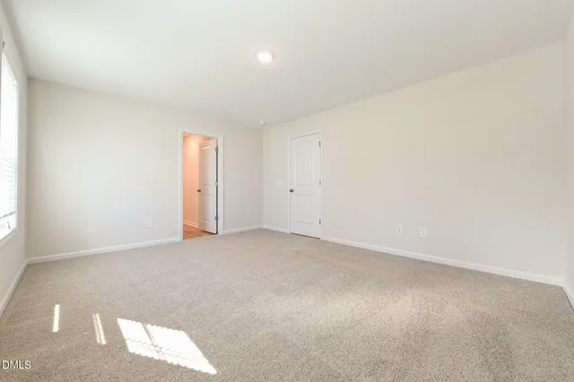 a bathroom with a sink a mirror and a shower