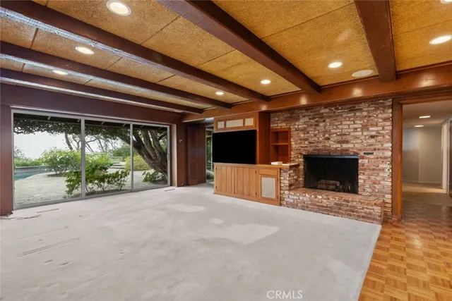 a view of livingroom with furniture and window
