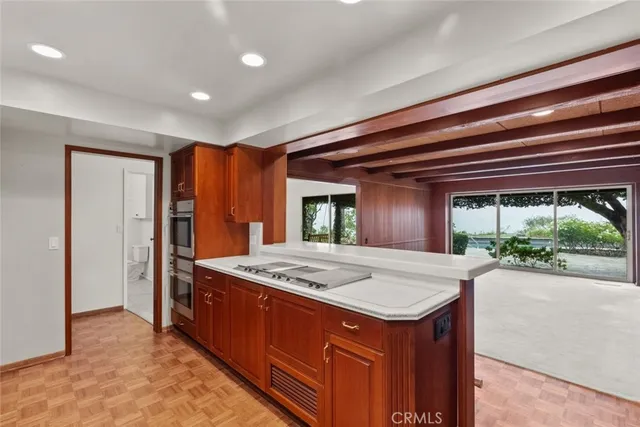 a view of an empty room with a balcony