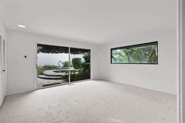 a bathroom with a sink mirror and vanity