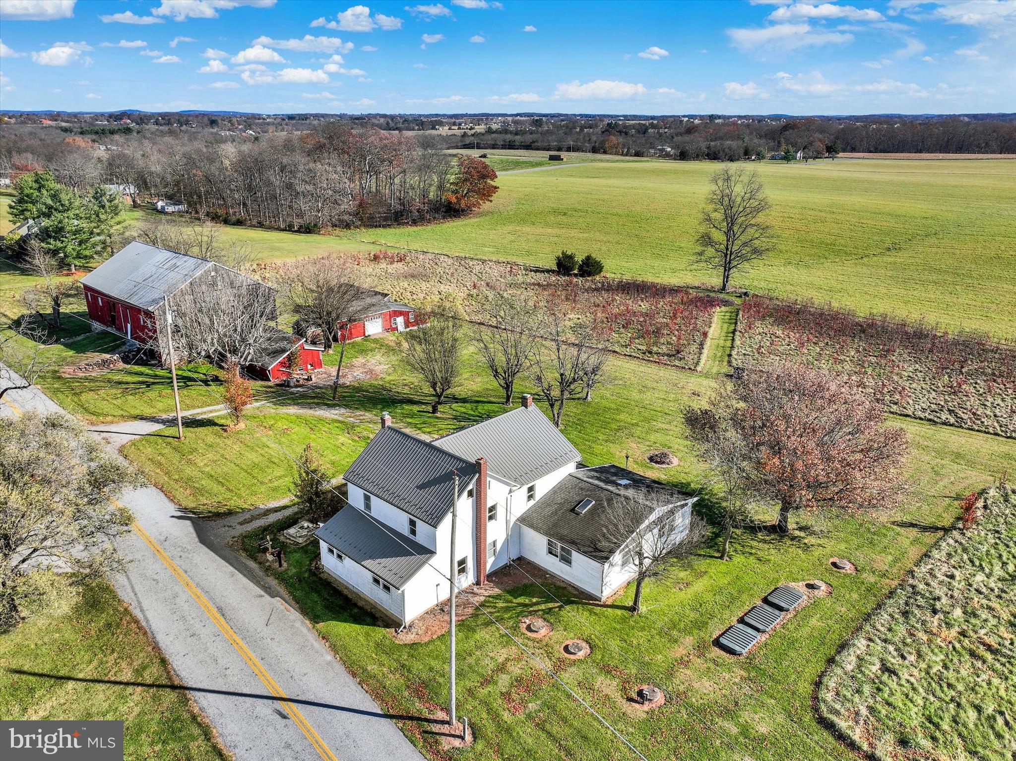 an aerial view of a house with outdoor space swimming pool and outdoor seating