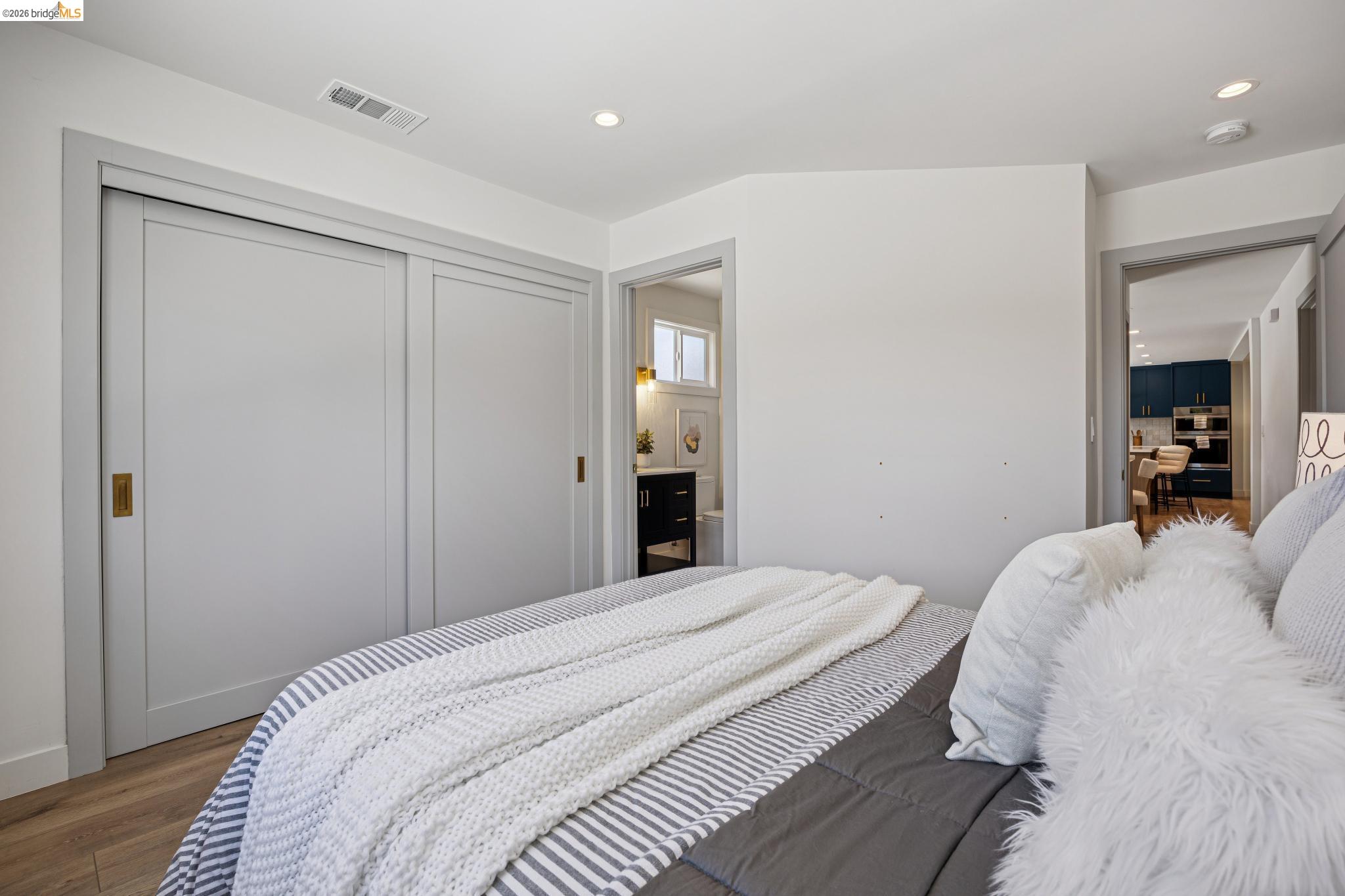 11 Belinda Court San Ramon, CA 94583 - Photo 15 of 33 Bedroom featuring wood-finish flooring and light gray walls