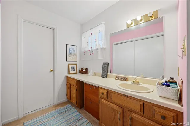 a kitchen with stainless steel appliances granite countertop a sink and wooden floor