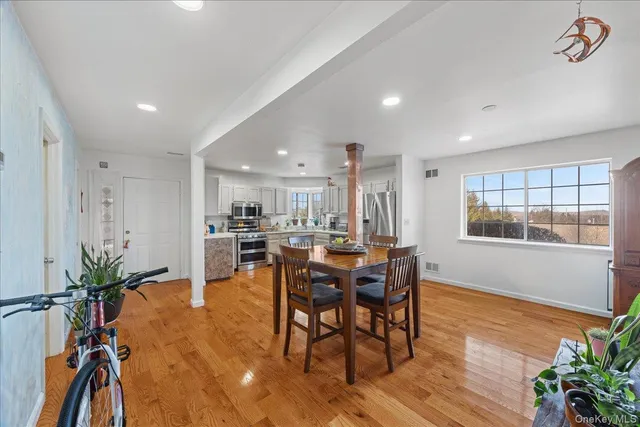 a view of a big room with a wooden walls