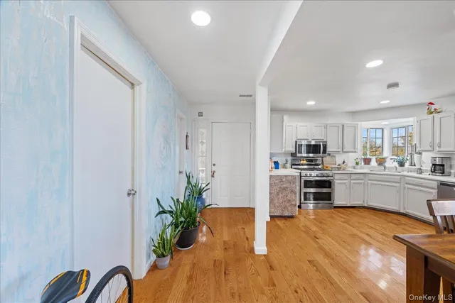 a dining room with furniture and window or wooden floor