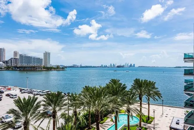 a view of a lake with a city