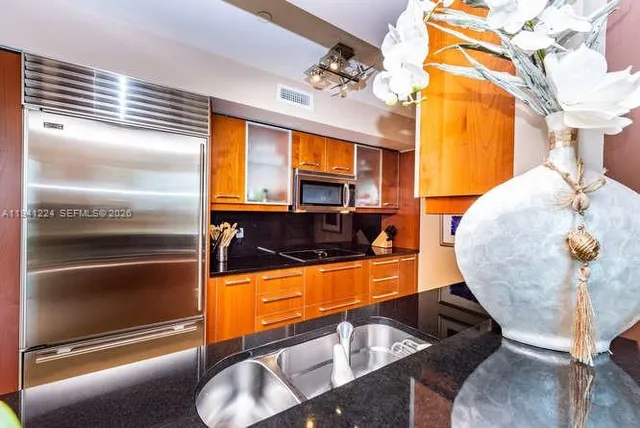 a view of living room with furniture and a window