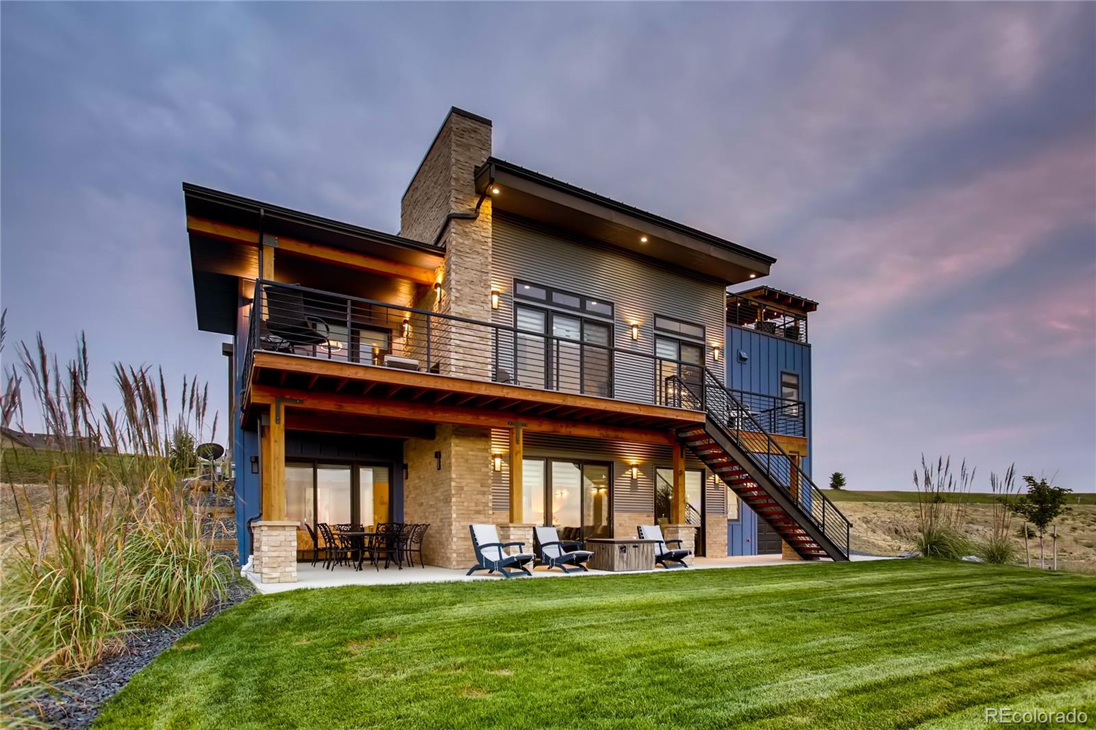 2147 Picture Point Drive Windsor, CO 80550 - Photo 1 of 39 a view of a house with a big yard and large trees