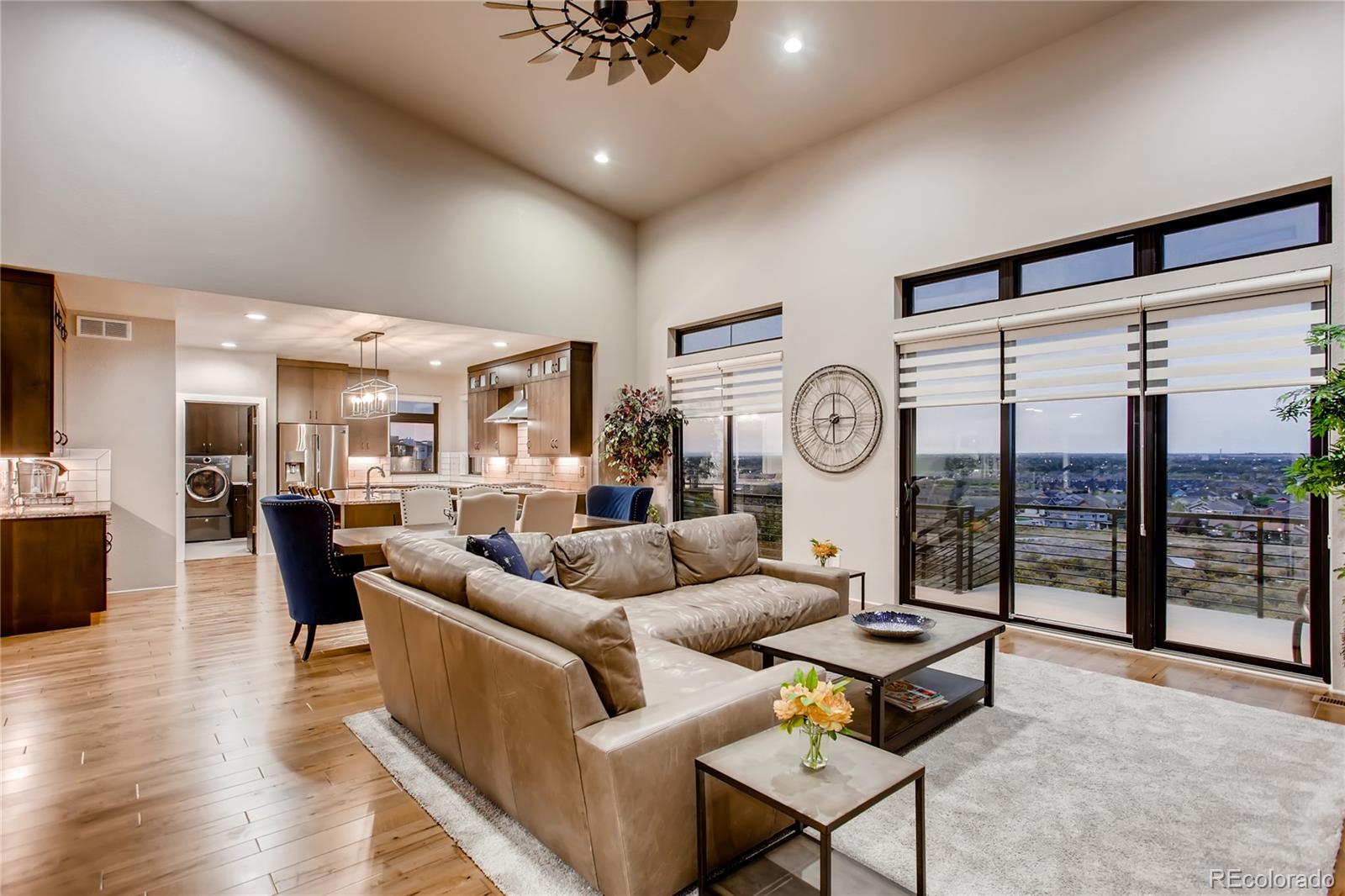 2147 Picture Point Drive Windsor, CO 80550 - Photo 21 of 39 a living room with furniture and a large window