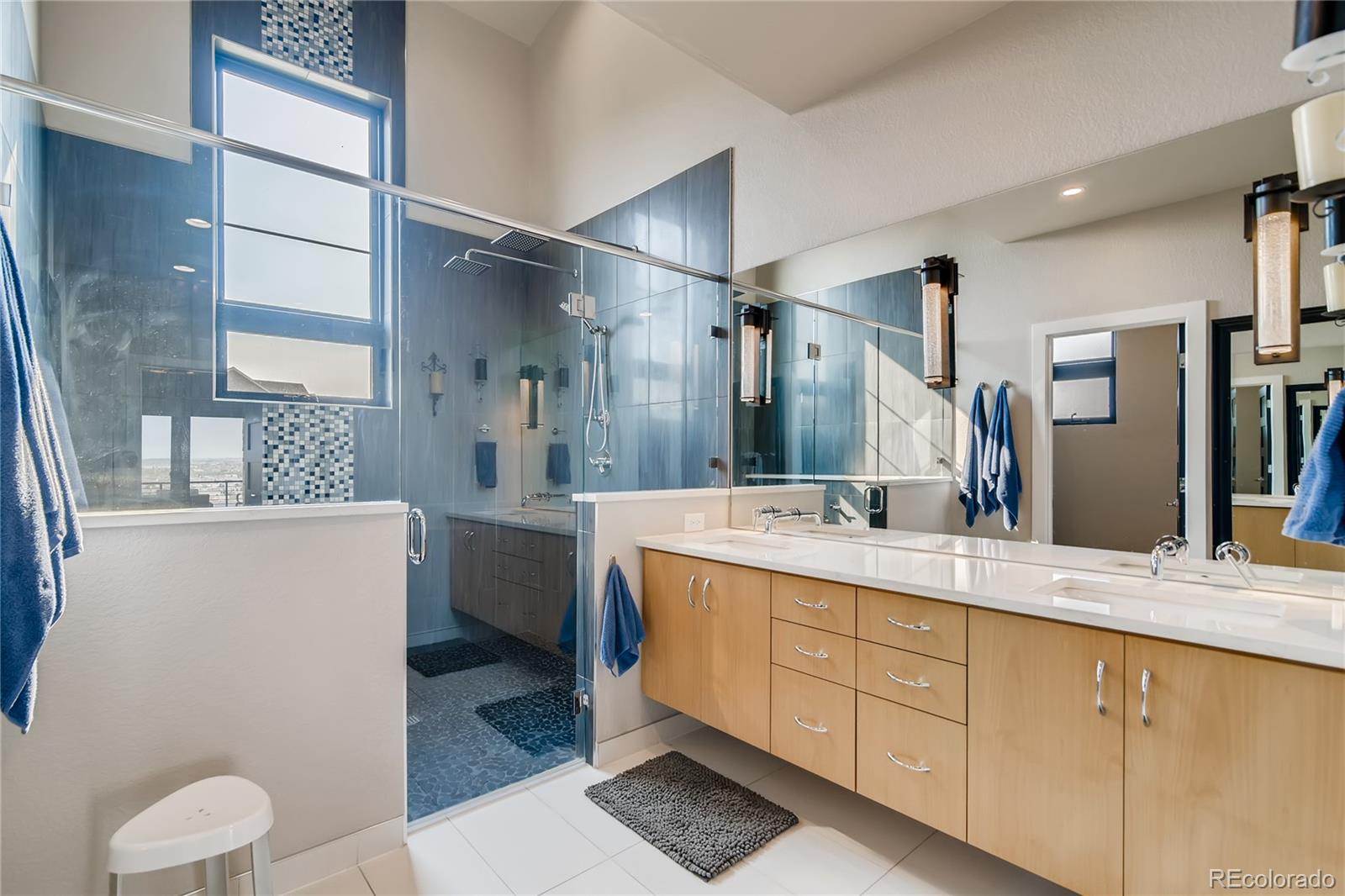 2147 Picture Point Drive Windsor, CO 80550 - Photo 23 of 39 a bathroom with a granite countertop sink mirror vanity and toilet