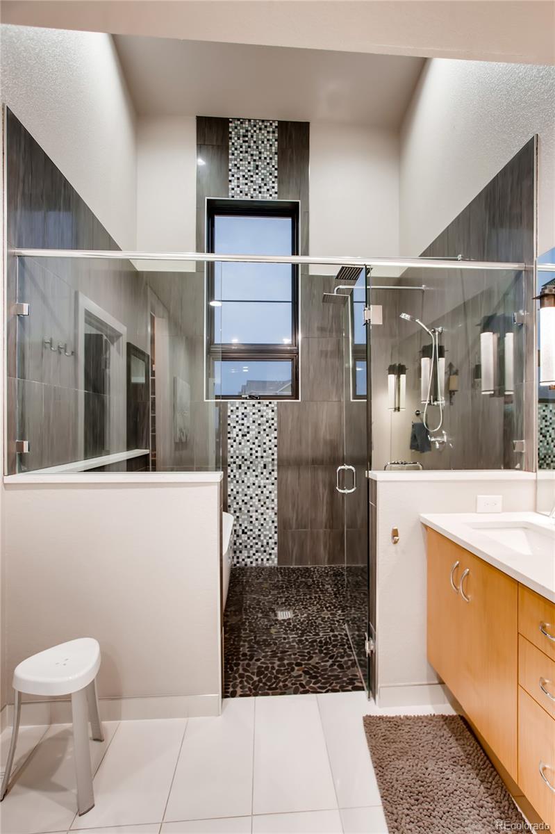2147 Picture Point Drive Windsor, CO 80550 - Photo 24 of 39 a bathroom with a sink and a mirror