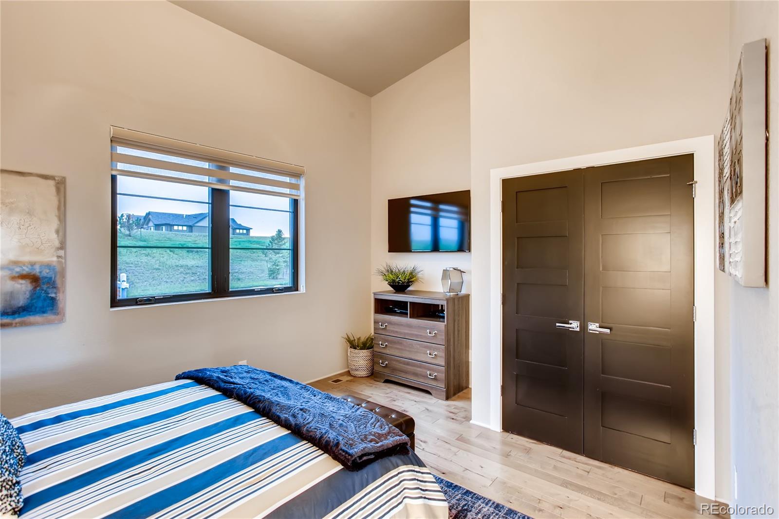 2147 Picture Point Drive Windsor, CO 80550 - Photo 25 of 39 a bedroom with a bed and a window