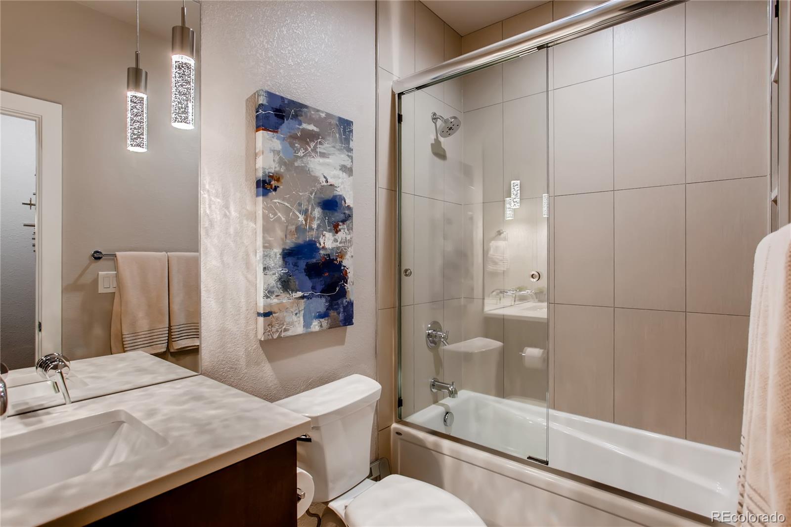 2147 Picture Point Drive Windsor, CO 80550 - Photo 26 of 39 a bathroom with a sink a toilet and shower