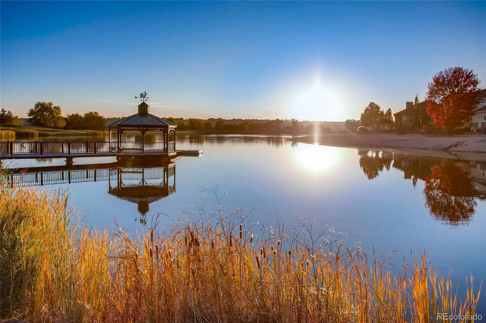 2147 Picture Point Drive Windsor, CO 80550 - Photo 38 of 39 a view of a lake with outside a house
