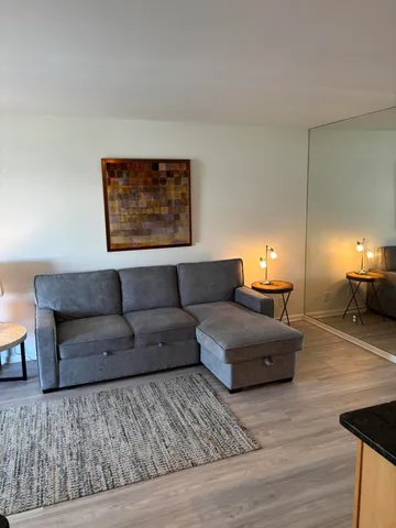 a living room with furniture and a couch