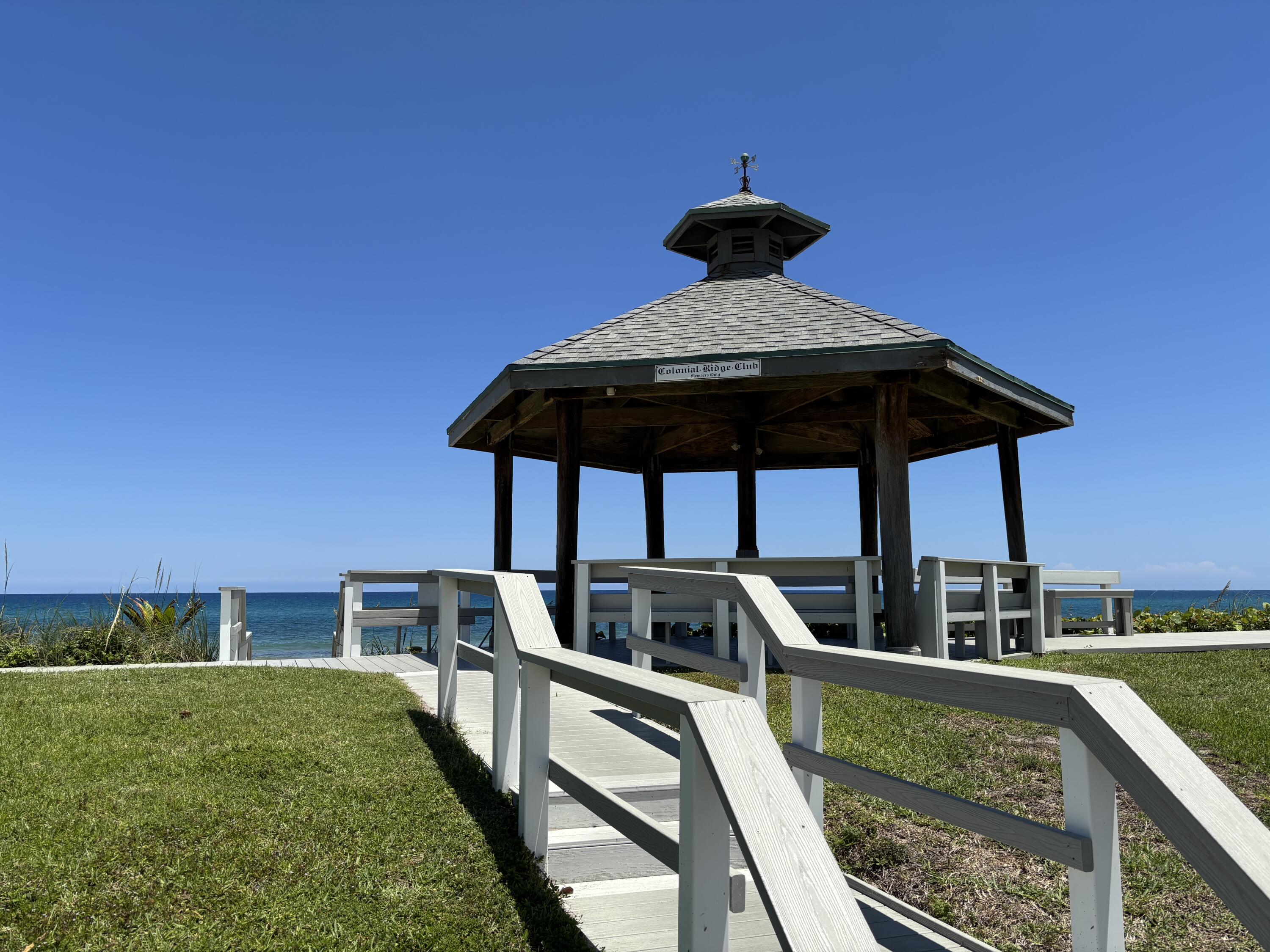 5505 North Ocean Boulevard, Unit 3204 Ocean Ridge, FL 33435 - Photo 19 of 33 a front view of a house with garden