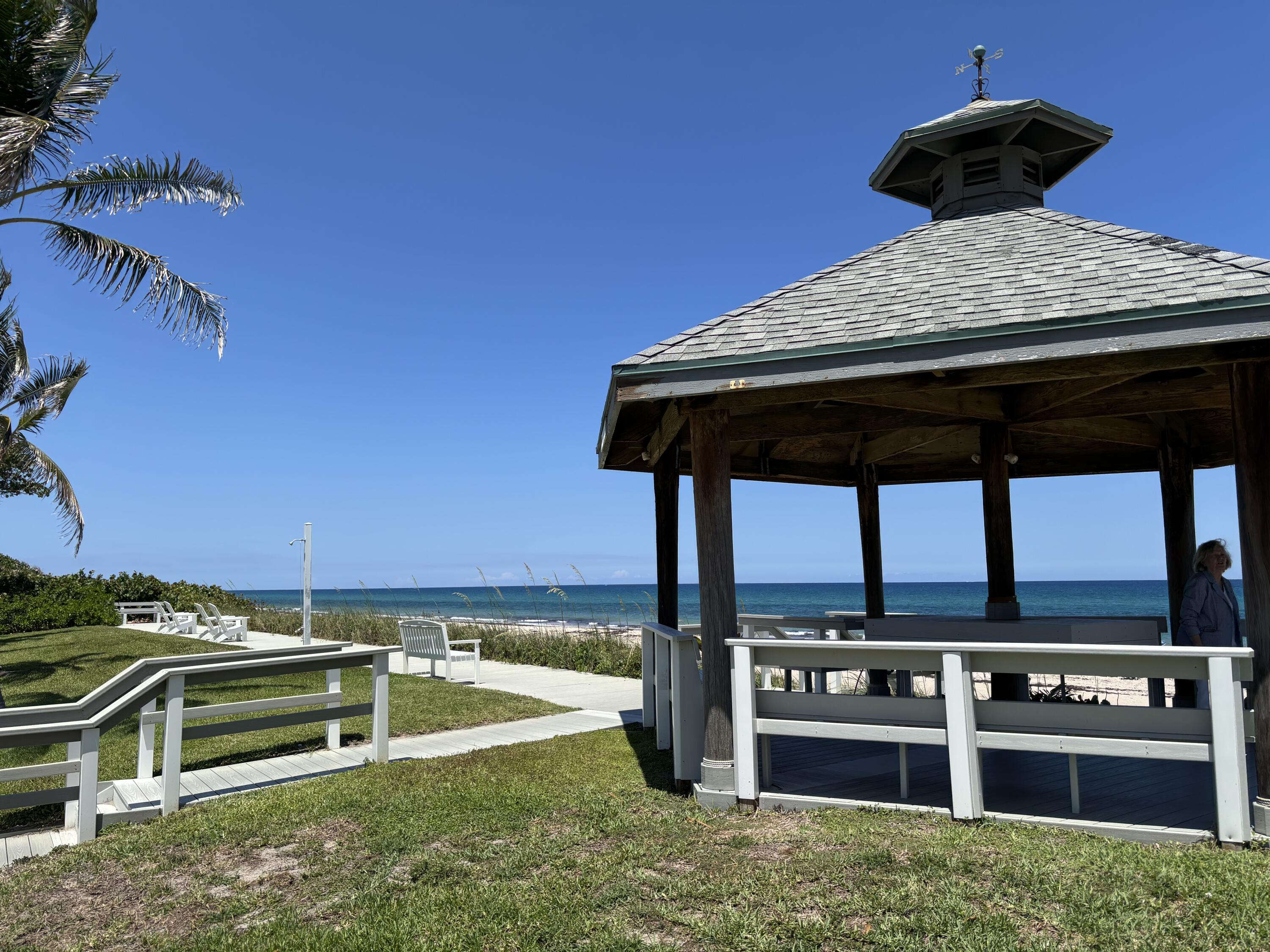 5505 North Ocean Boulevard, Unit 3204 Ocean Ridge, FL 33435 - Photo 26 of 33 a kitchen with a stove and a microwave