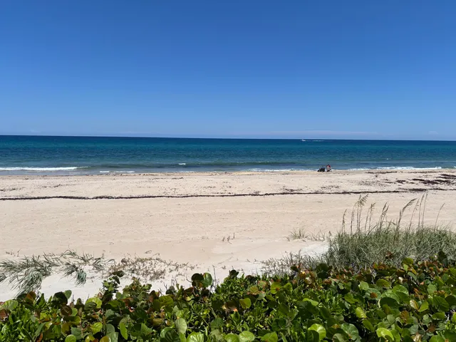 a view of a tennis room with a large window