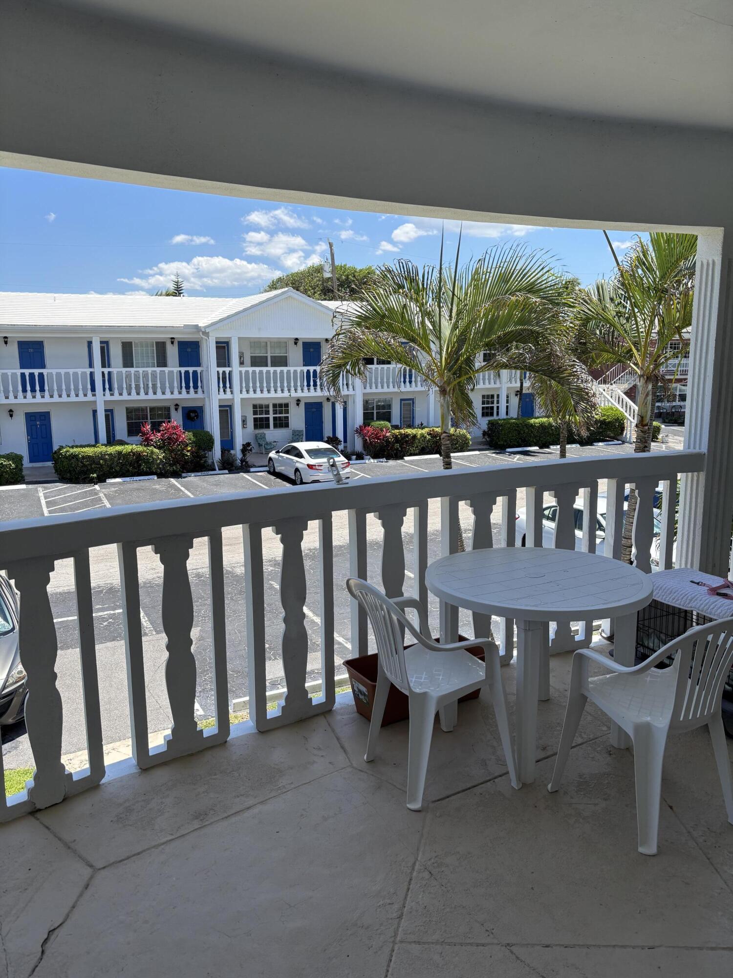 5505 North Ocean Boulevard, Unit 3204 Ocean Ridge, FL 33435 - Photo 3 of 33 a view of a chairs and table in patio
