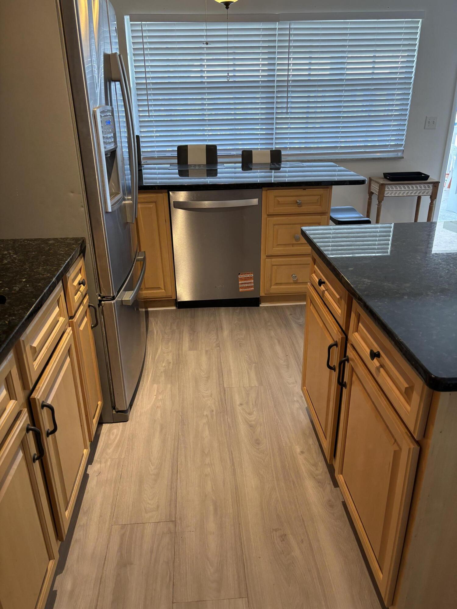 5505 North Ocean Boulevard, Unit 3204 Ocean Ridge, FL 33435 - Photo 9 of 33 a view of a room with wooden floor