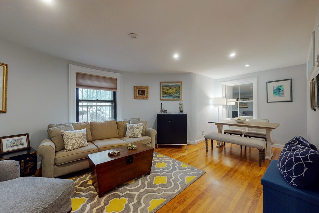 242 Beacon Street, Unit 2 Boston, MA 02116 - Photo 3 of 10 a living room with furniture and a window