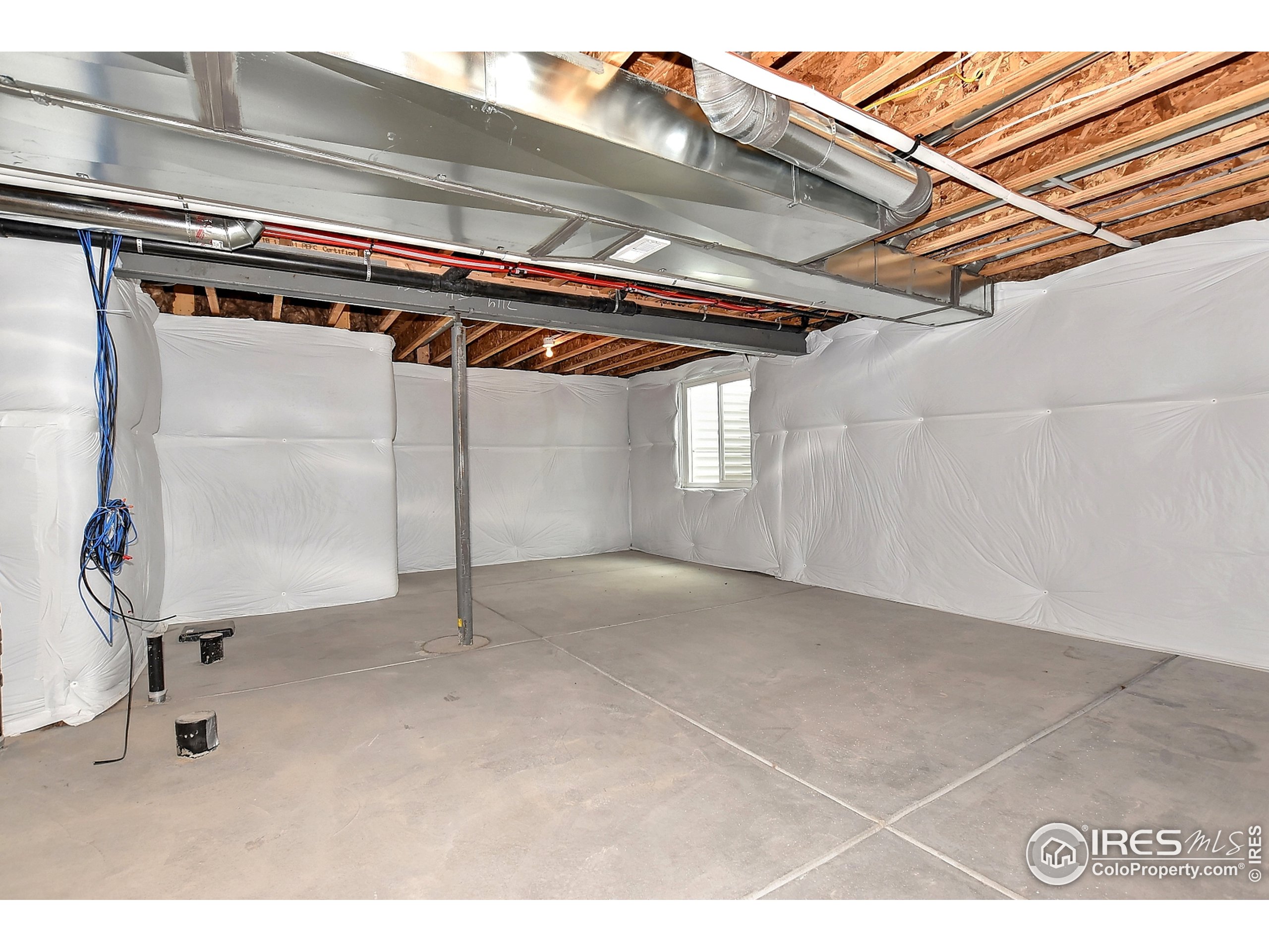 6630 Pebble Path Court Timnath, CO 80547 - Photo 16 of 18 a view of a room with gym equipment