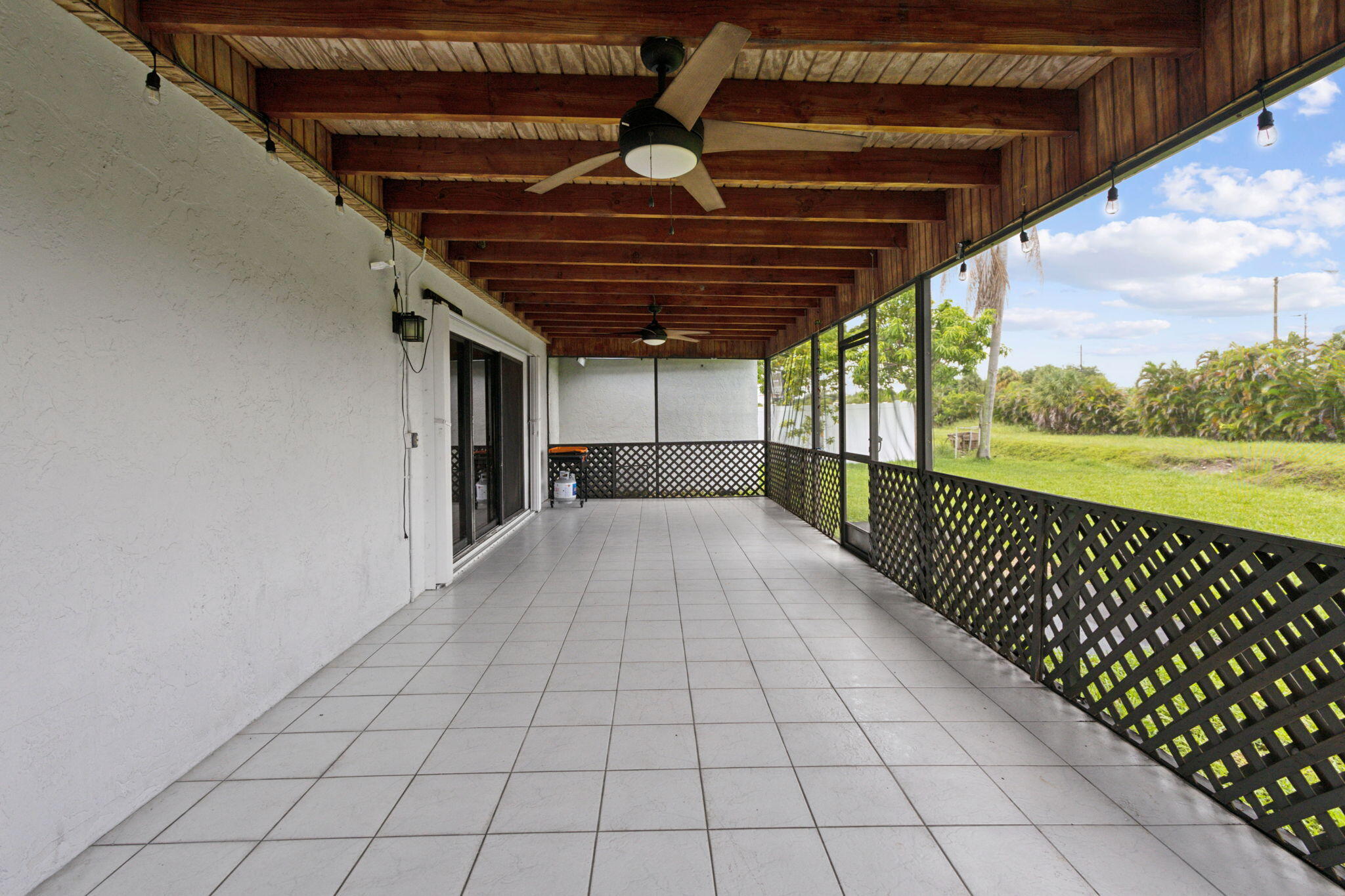 9199 Edgemont Lane Boca Raton, FL 33434 - Photo 31 of 39 Covered Patio