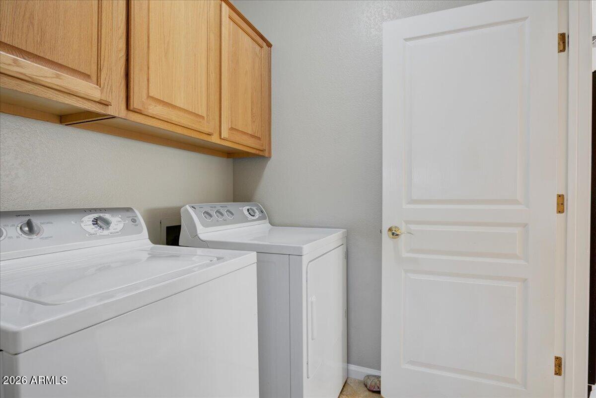 4906 East Wagoner Road Scottsdale, AZ 85254 - Photo 17 of 29 a utility room with dryer and washer