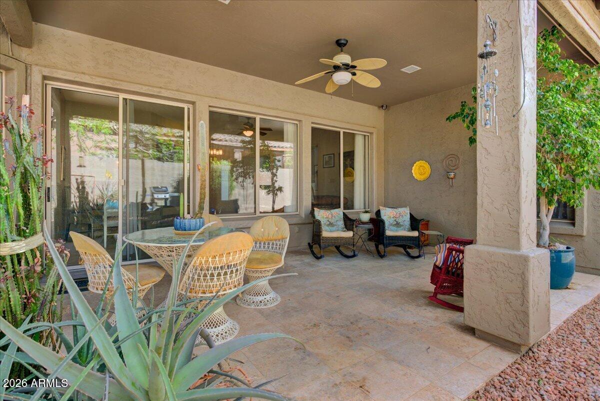 4906 East Wagoner Road Scottsdale, AZ 85254 - Photo 18 of 29 a building outdoor space with patio furniture and potted plants