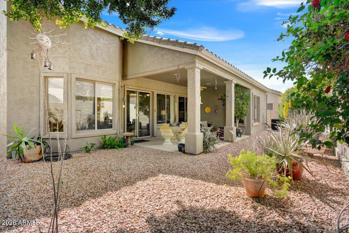 4906 East Wagoner Road Scottsdale, AZ 85254 - Photo 20 of 29 a front view of a house with outdoor seating