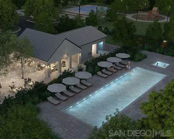 an aerial view of a house having yard