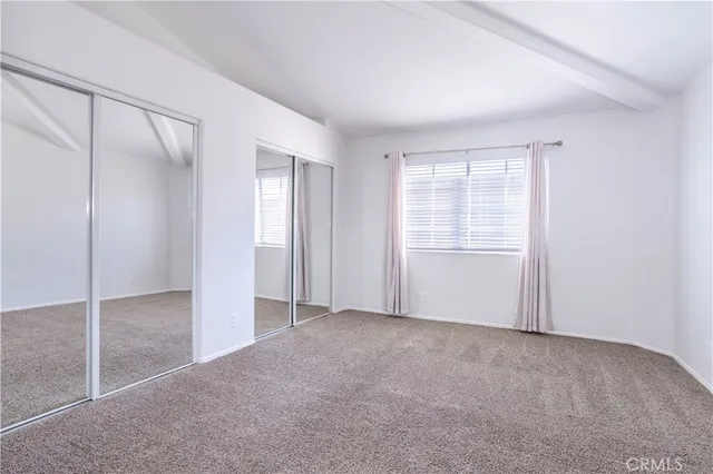 a view of a building with sitting area