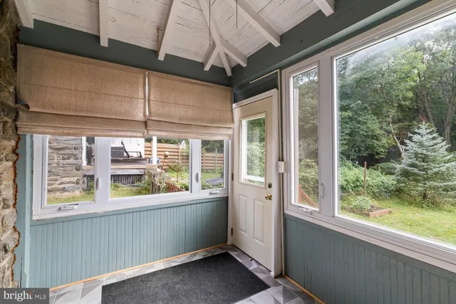a view of a house with a large window