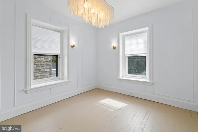 an empty room with windows