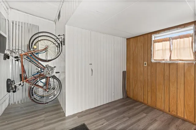 a view of an entryway with wooden floor