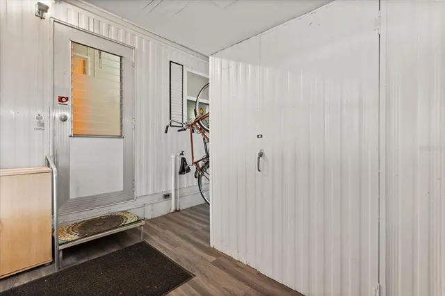 a view of a bathroom with a tub and shower